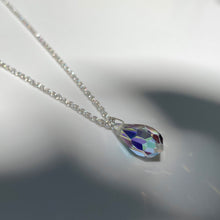 Load image into Gallery viewer, Silver necklace with multifaceted aurora borealis crystal pendant. Chain is made from polished 925 (sterling) silver, pendant made from crystal glass. The length of the chain is 50 cm, the pendant is 18mm long.